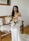 Bride holding a Chelle bridal bouquet