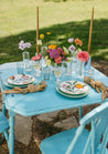 A table setting featuring our Wylder bud vase collection
