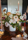 Mid-sized Chelle centerpiece with pastel florals in white vessel